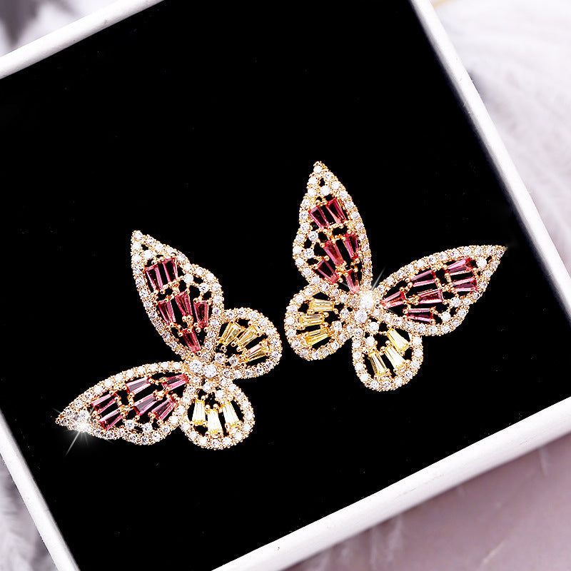 Hollow pink zircon butterfly earrings Brand: aeac