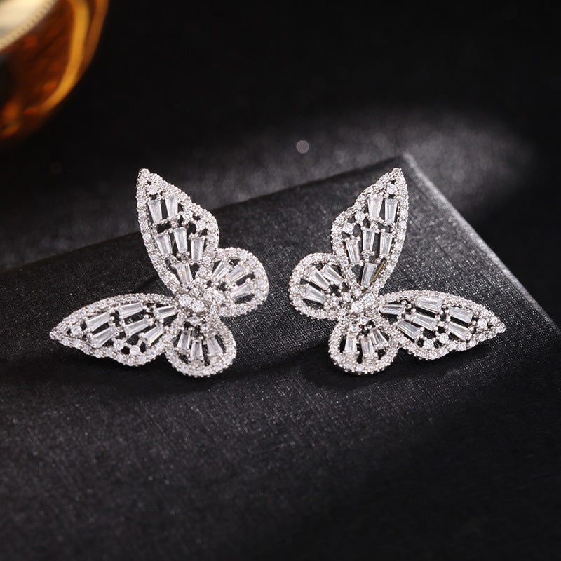 Hollow pink zircon butterfly earrings Brand: aeac