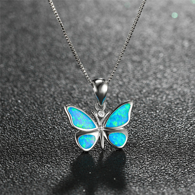 White Gold Blue Opal Butterfly Necklace Brand: aeac