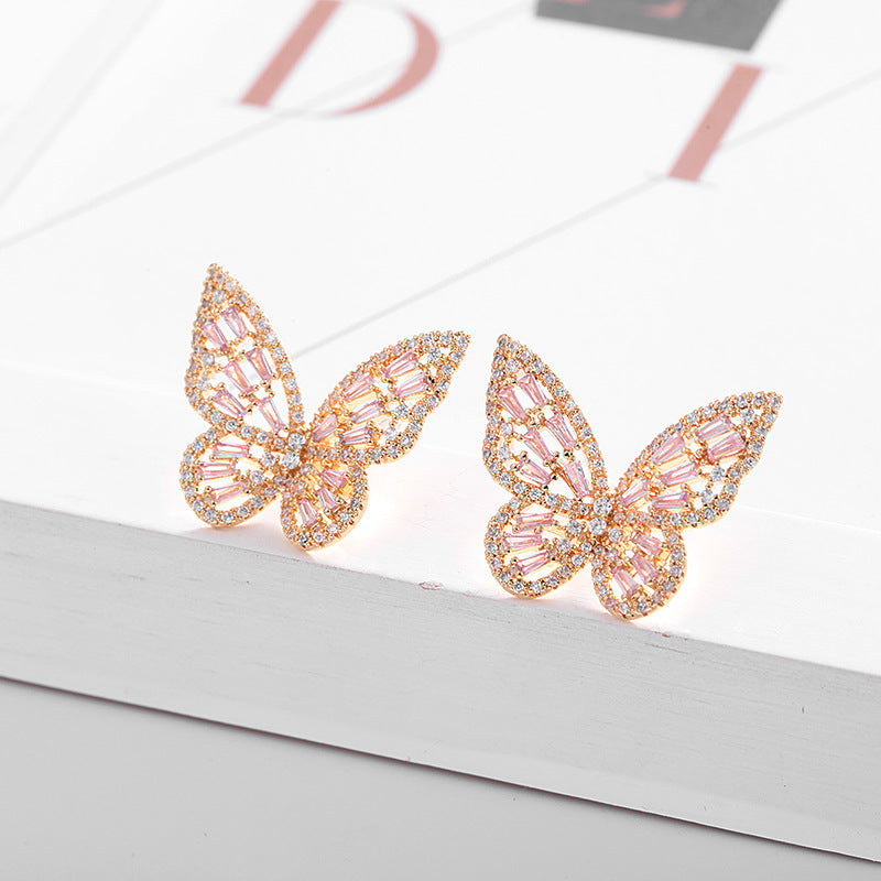 Hollow pink zircon butterfly earrings Brand: aeac