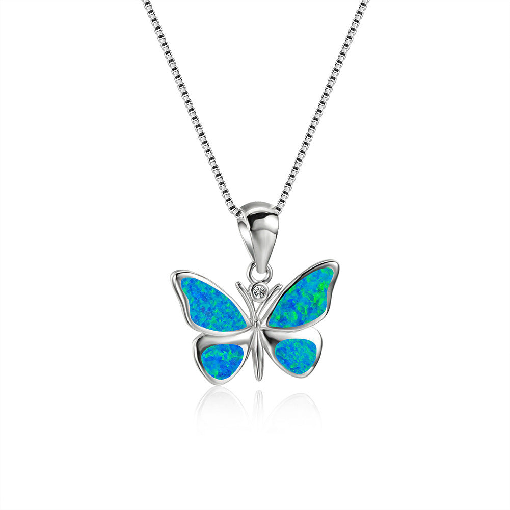 White Gold Blue Opal Butterfly Necklace Brand: aeac