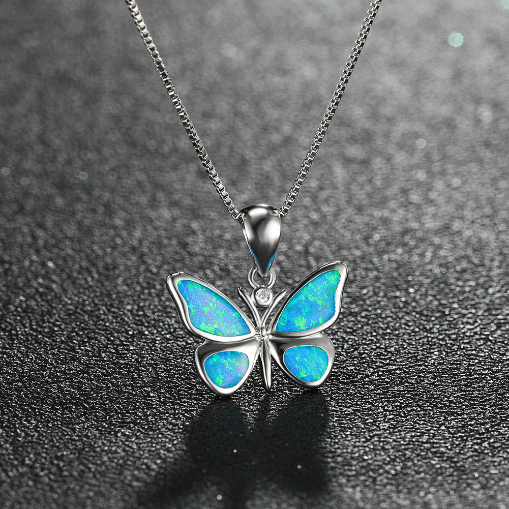White Gold Blue Opal Butterfly Necklace Brand: aeac