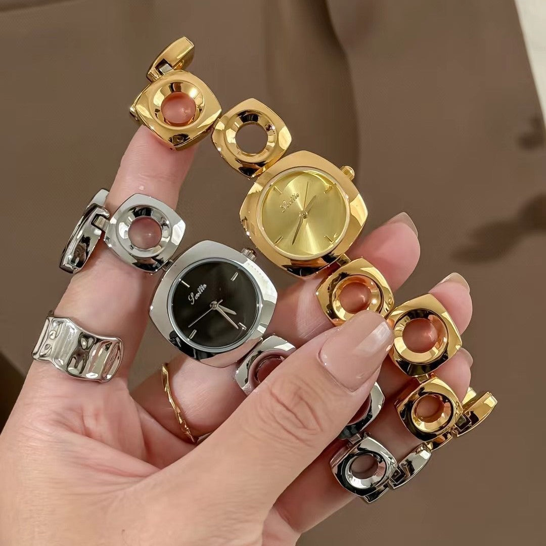 Women's Irregular Hollow-out Gold Fashion Good-looking Bracelet Watch Brand: aeac