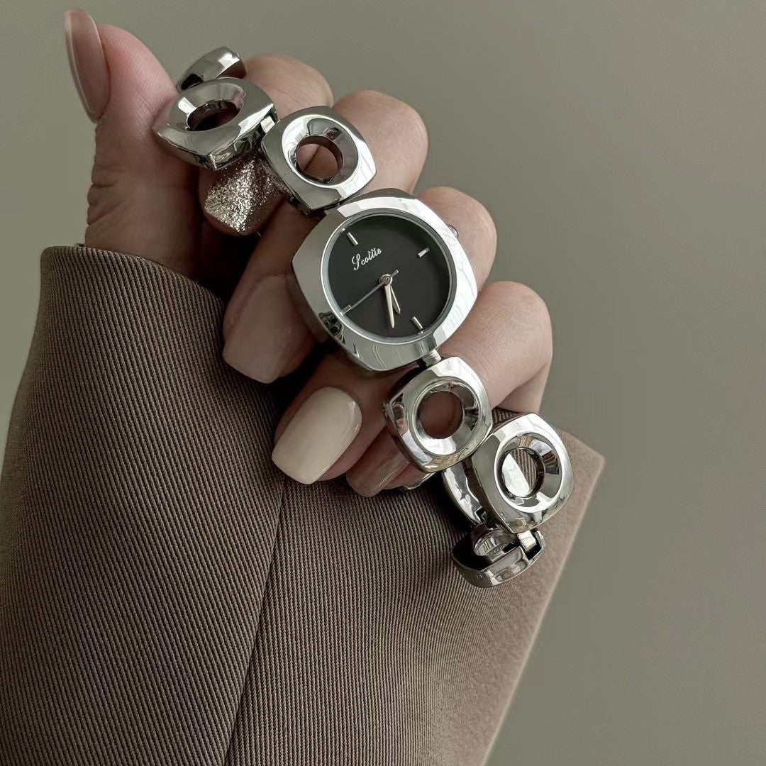 Women's Irregular Hollow-out Gold Fashion Good-looking Bracelet Watch Brand: aeac