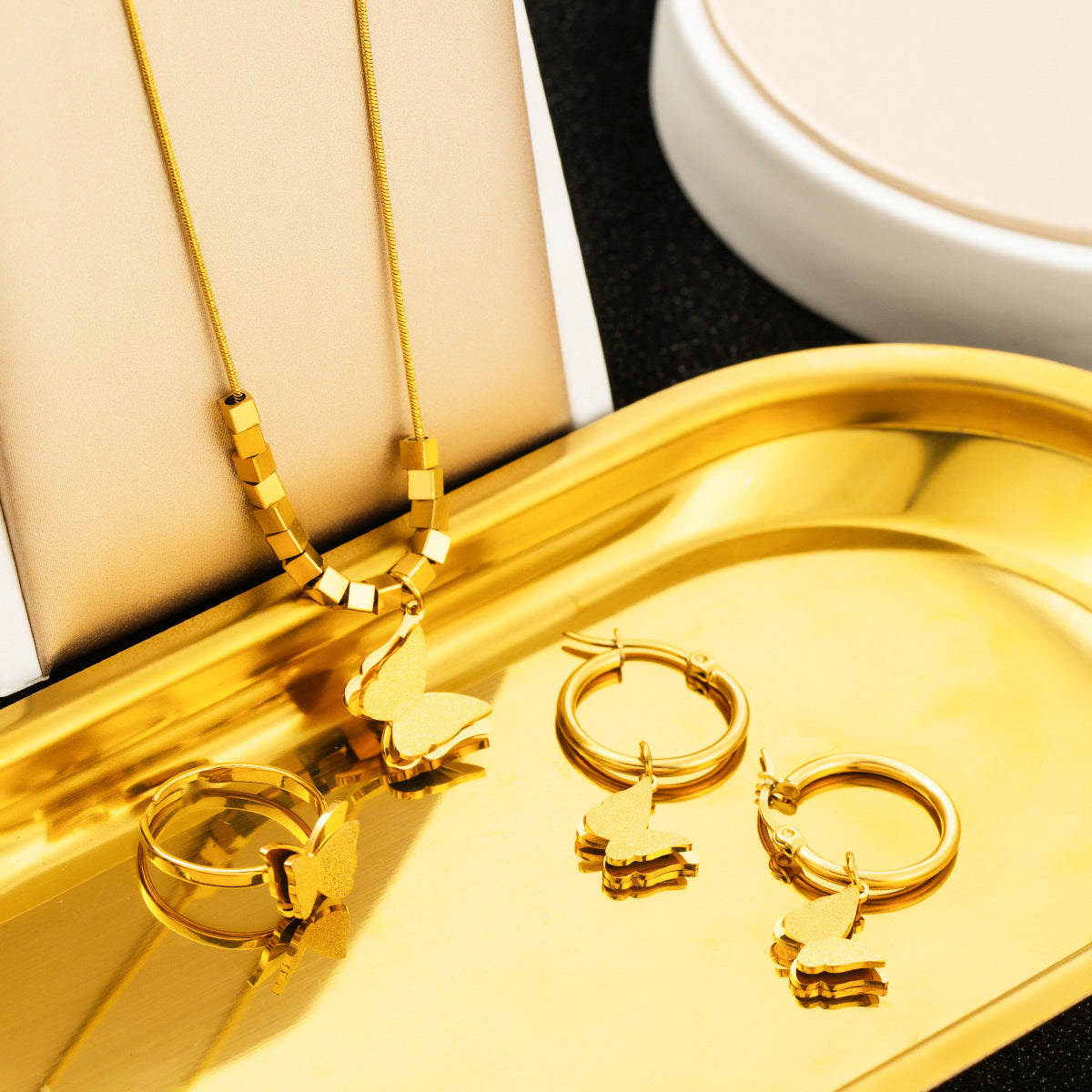 Stainless Steel Jewelry Set Necklace Earrings Ring Three-piece Set Brand: aeac