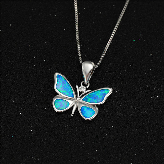 White Gold Blue Opal Butterfly Necklace Brand: aeac