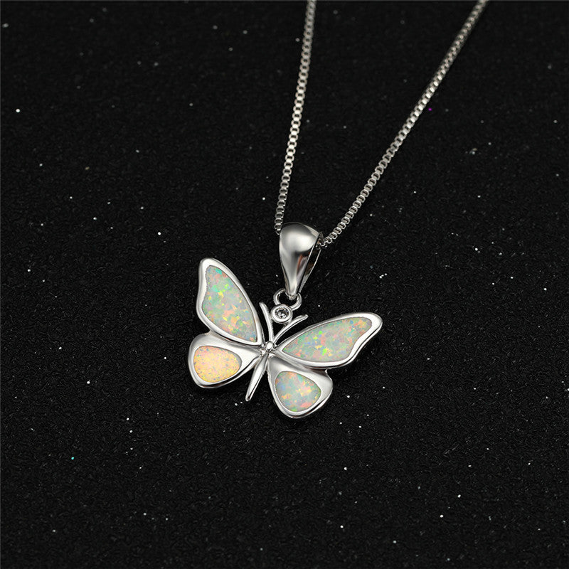 White Gold Blue Opal Butterfly Necklace Brand: aeac