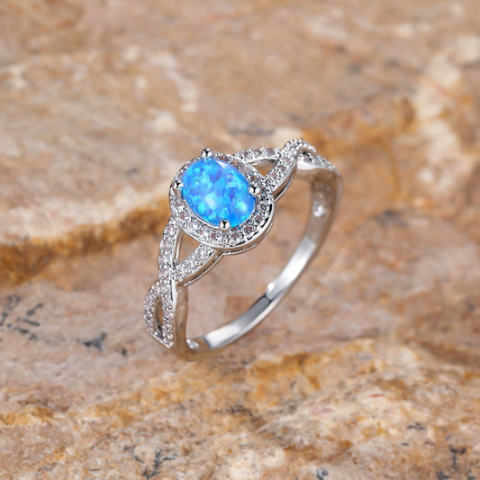 Artistic Retro White K Egg-shaped Blue Opal Edge White Diamond Lace Ring Brand: aeac