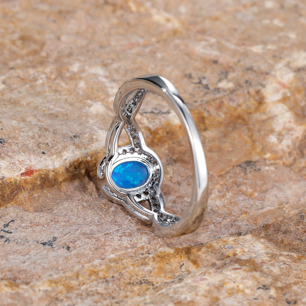 Artistic Retro White K Egg-shaped Blue Opal Edge White Diamond Lace Ring Brand: aeac