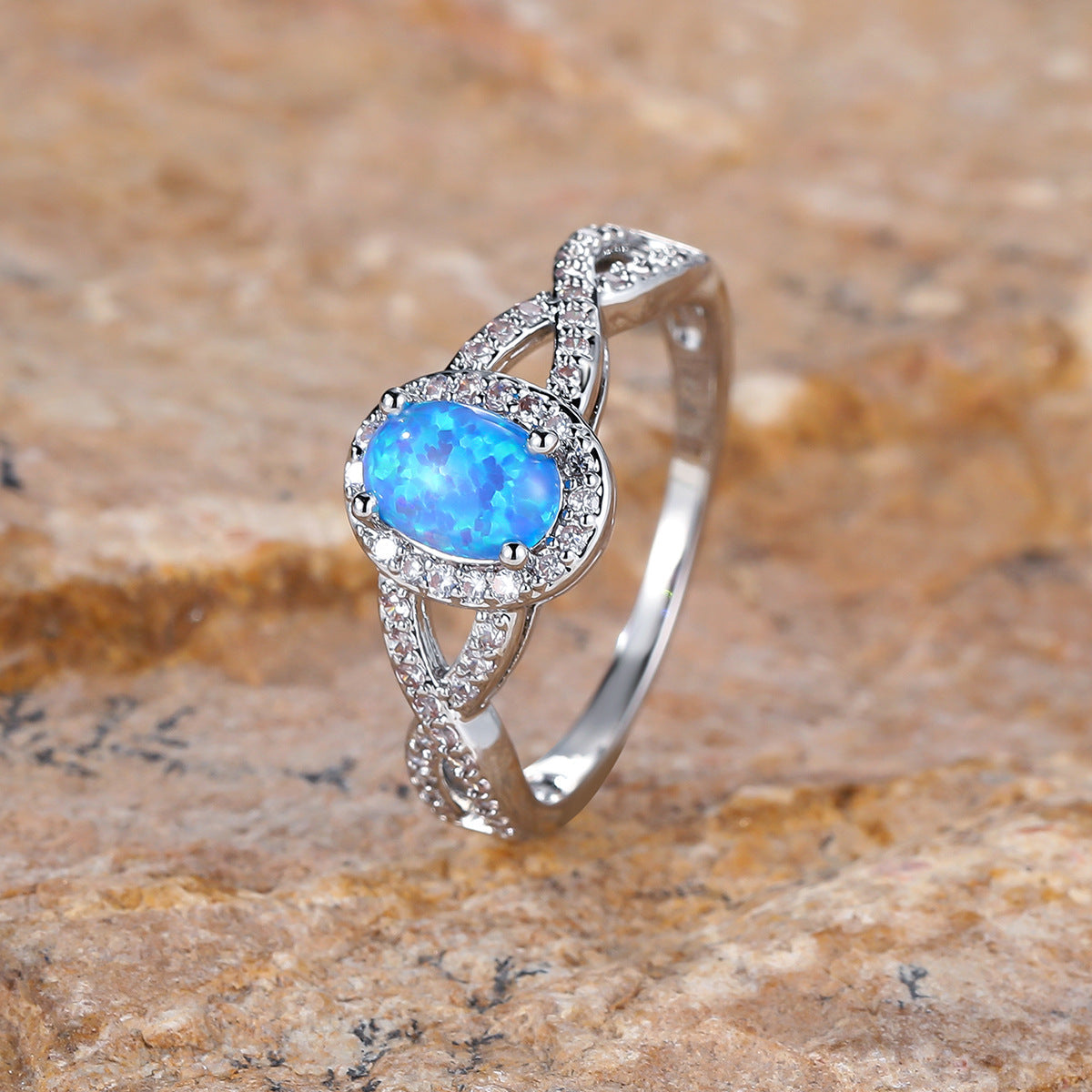 Artistic Retro White K Egg-shaped Blue Opal Edge White Diamond Lace Ring Brand: aeac