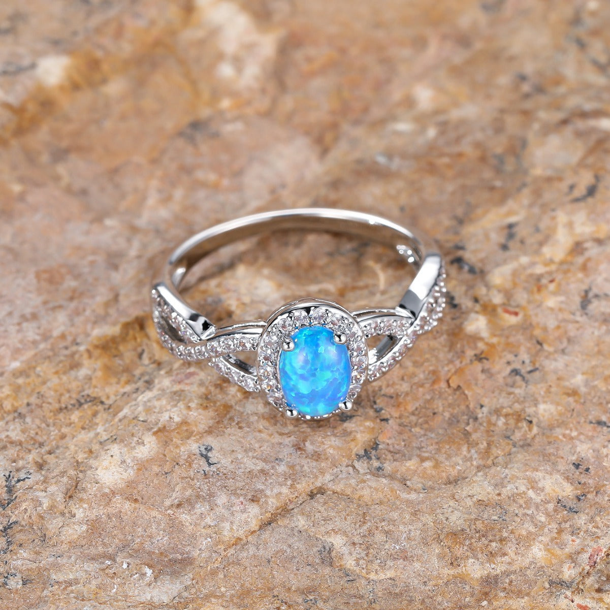 Artistic Retro White K Egg-shaped Blue Opal Edge White Diamond Lace Ring Brand: aeac